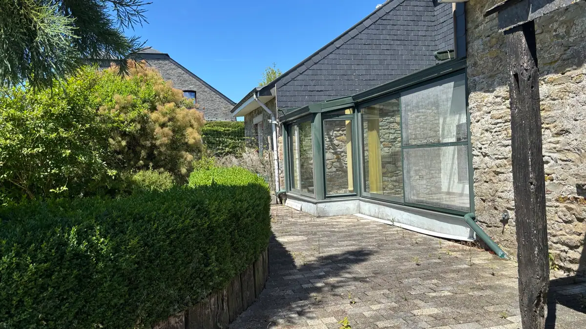 La terrasse actuelle devant la véranda